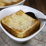 a bowl with vegan french onion soup on cloth